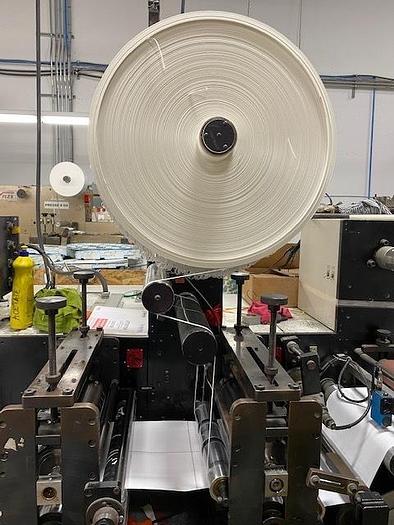 Used 13" WIDE ROTOFLEX DLI REWINDER WITH 2 STATION DIE CUTTING - RECENT DRIVE UPDATE