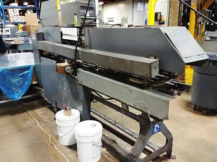 Used Burt AU-611 Roll thru labeler set for 401 cans