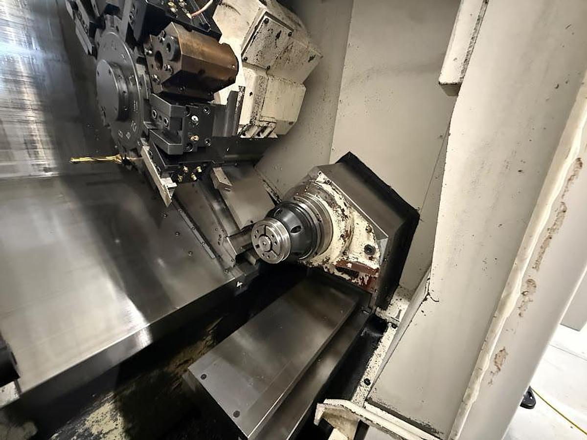 Used 2020 Okuma GENOS L300-MYW Lathe w/ Bar Feeder and Conveyor