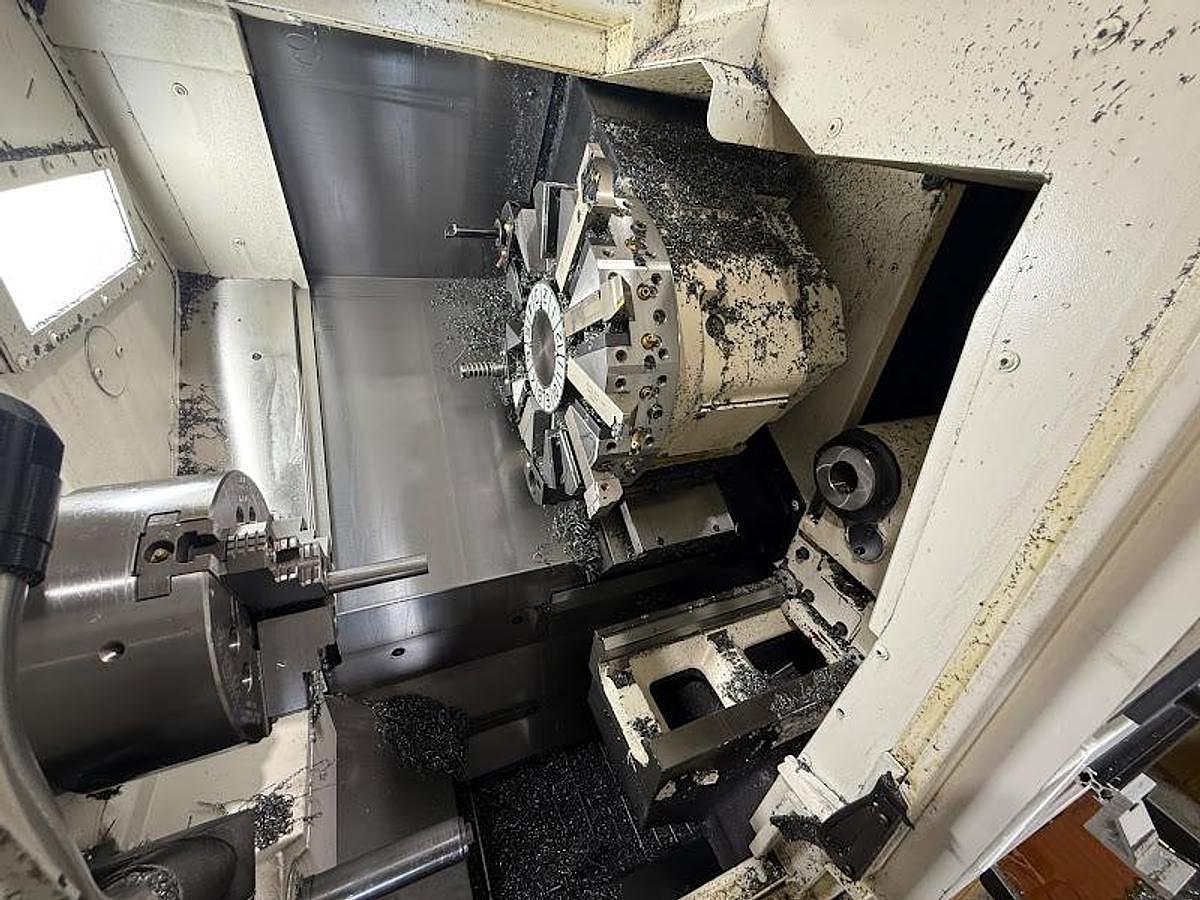 Used 2018 Okuma GENOS L250II-e Lathe w/ Bar Feeder and Conveyor