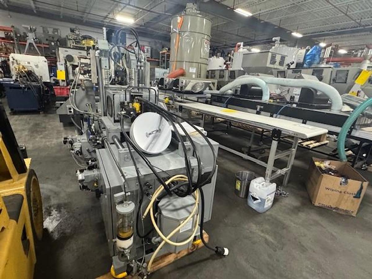 Used 30 Ton, 2 oz Newburry V2-30 Vertical Injection Molding