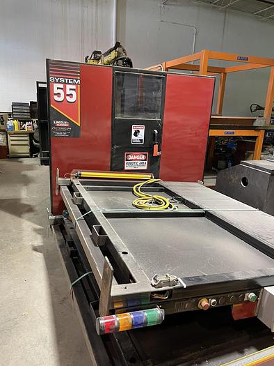 Used LINCOLN SYSTEM 55 WITH FANUC M710iC/20L TORCH CUTTING CELL WITH DUAL ROLL IN ROLL OUT TABLES