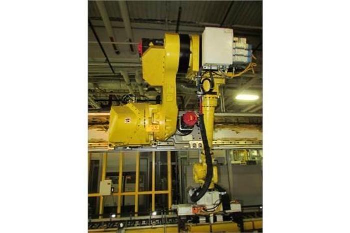 Used FANUC GANTRY ROBOT SYSTEM WITH M710iB/70T ROBOT 8' TALL X 10,200 MM TRAVEL RJ3iB CONTROLLER