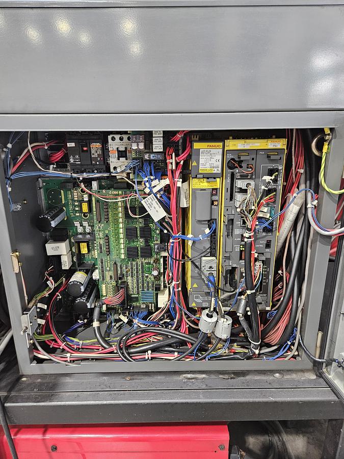 Used Complete Lincoln System 50 Robotic Welding Cell W/ FANUC 100ibe/R-30ia Dual HS and Safety