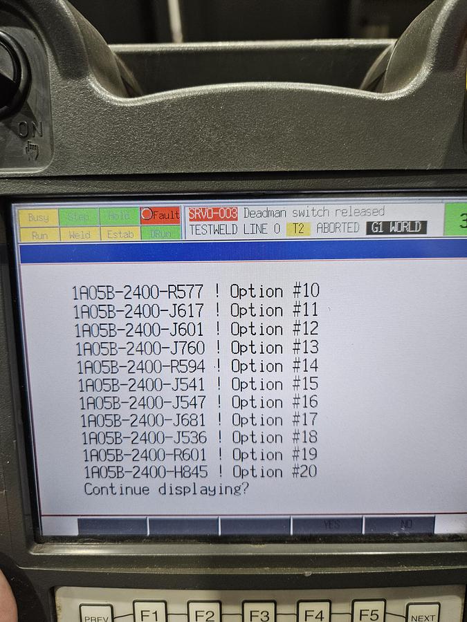 Used Lincoln system 35 weld cell Fanuc 120iC/10L with dual headstock positioners