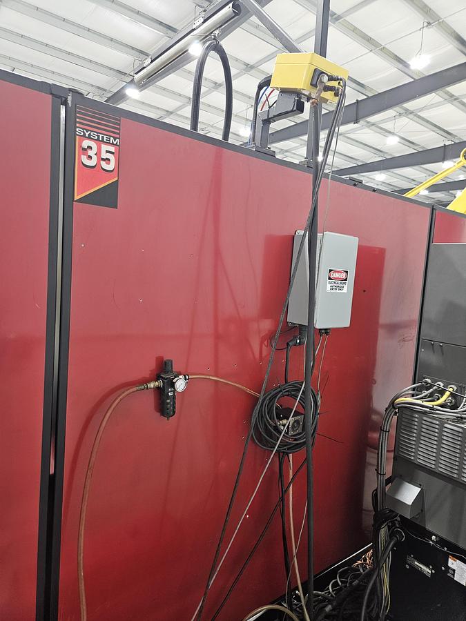 Used Lincoln system 35 weld cell Fanuc 120iC/10L with dual headstock positioners