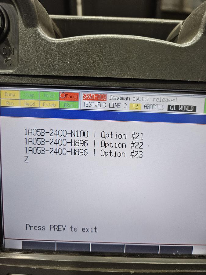 Used Lincoln system 35 weld cell Fanuc 120iC/10L with dual headstock positioners