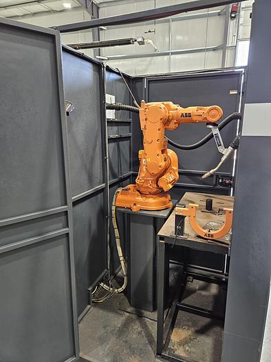 Used ABB IRB 140 Robotic Welding Cell With Enclosure and Miller Auto Axcess 450-DI