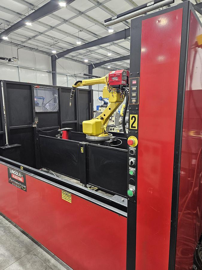Used Lincoln system 35 weld cell Fanuc 120iC/10L with dual headstock positioners