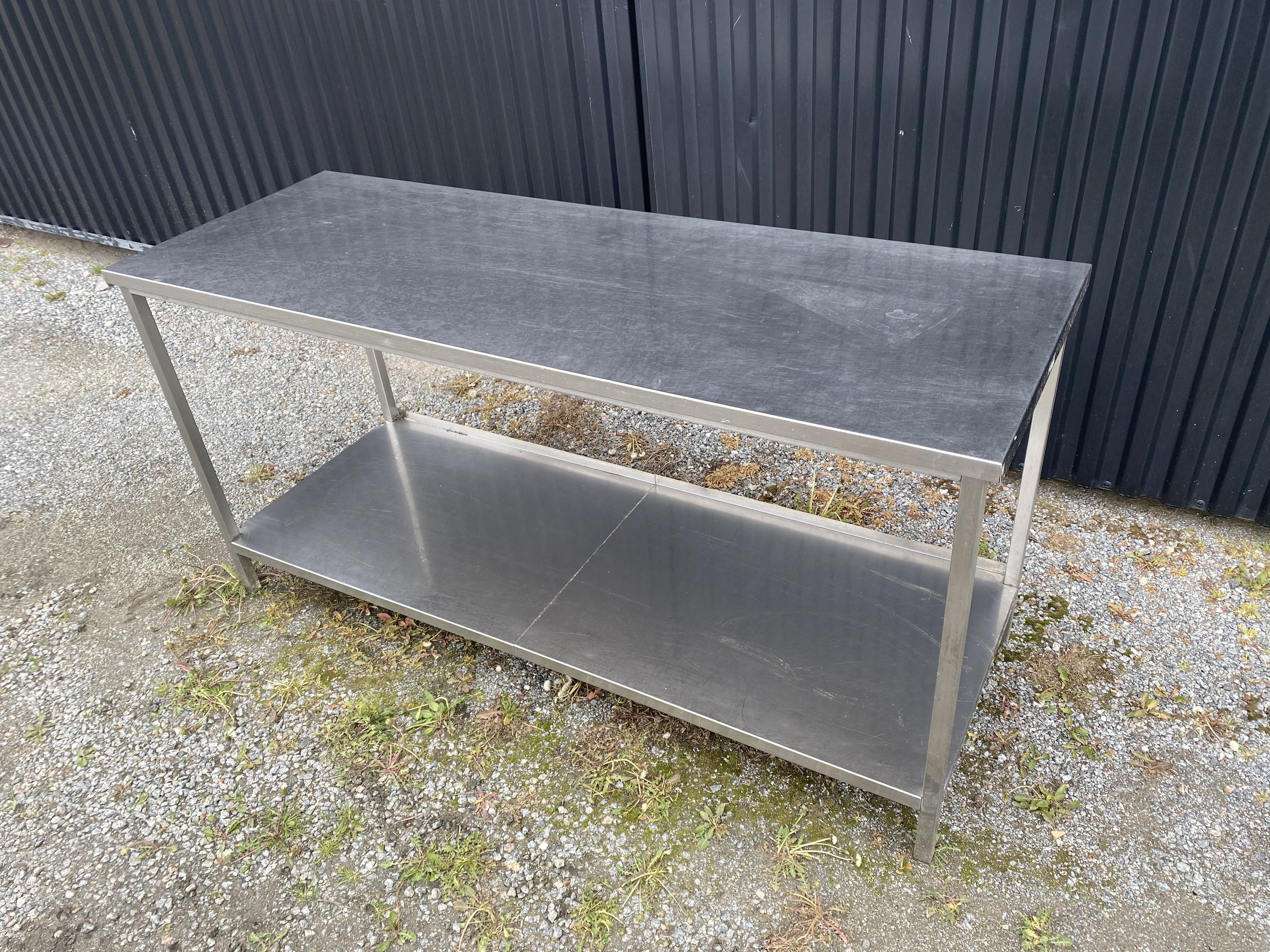 Begagnad Arbetsbord rostfritt 180x65cm
