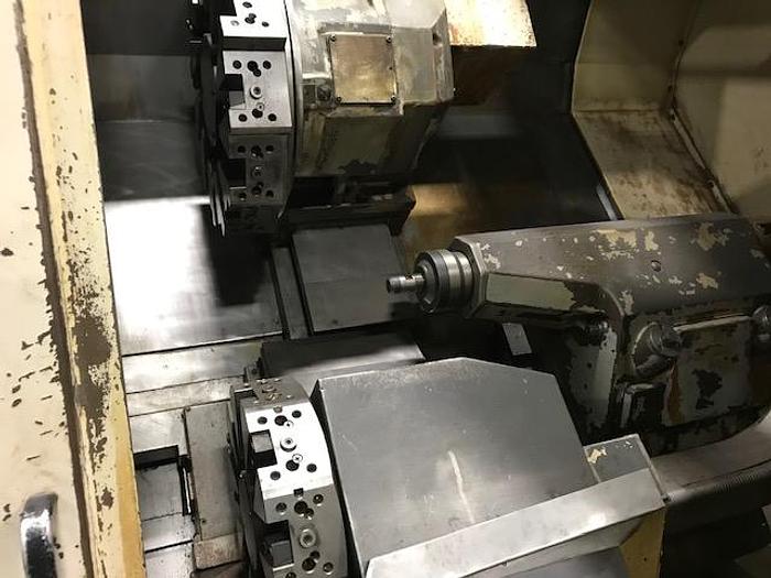 Used 1995 OKUMA  LU25, Twin Turret, Tailstock
