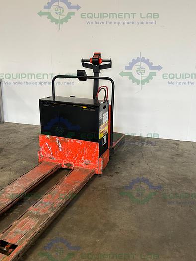 Used Raymond 112AT-FRE60L Rider Pallet Jack 6000 Lbs Capacity w/ Hawken Battery
