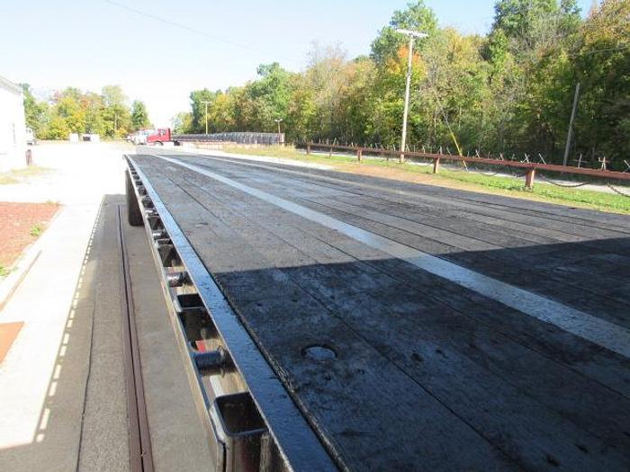 Used 2014 Great Dane Trailers  48' X 102" 3 AXLE Flatbed Moffett Trailer