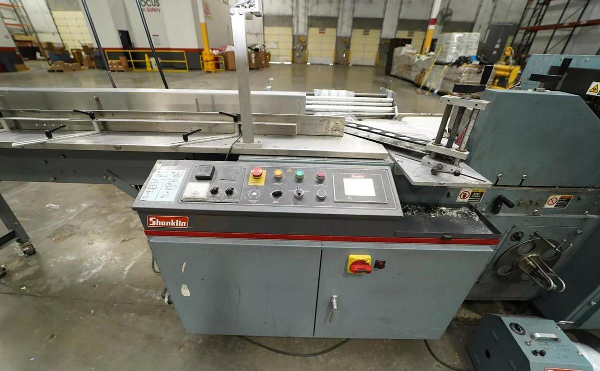 Used Shanklin F-5A & T-7XL Shrink Wrapper w/ (4) Longford B855 Feeders