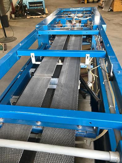 Used 2006 BRAUN REAR DISCHARGE TOWEL/GOWN FOLDER