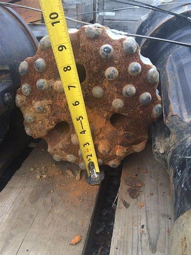 Used 9-3/4" SD10 Shank HAMMER BIT