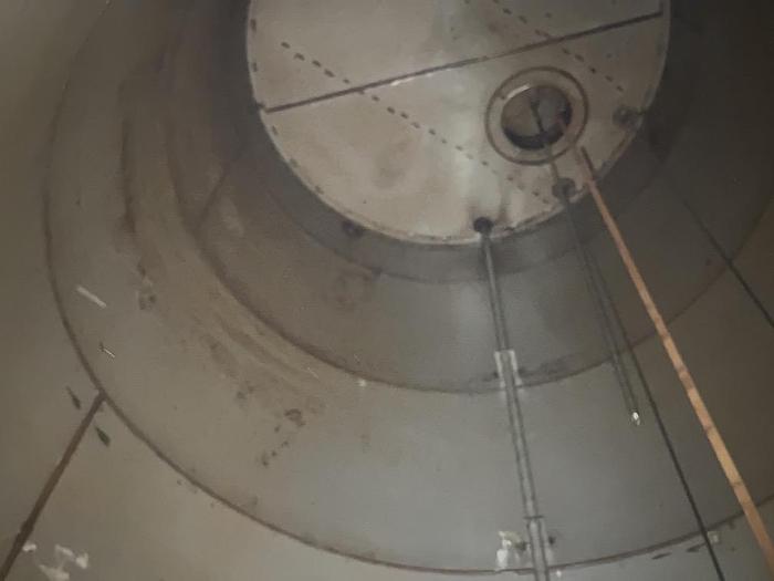 Used Roark Industries approximately 10,000 gallon SS vertical tank