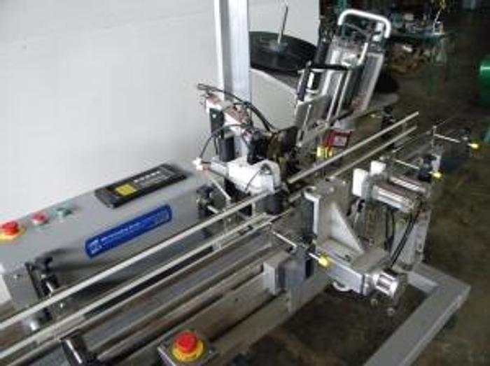 Used W.S. Packaging Group Neck Labeler