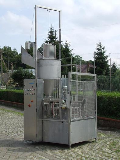 Used 2-piston, 2-row carousel dispenser for plastic and aluminum packaging with lids welding, Grunwald