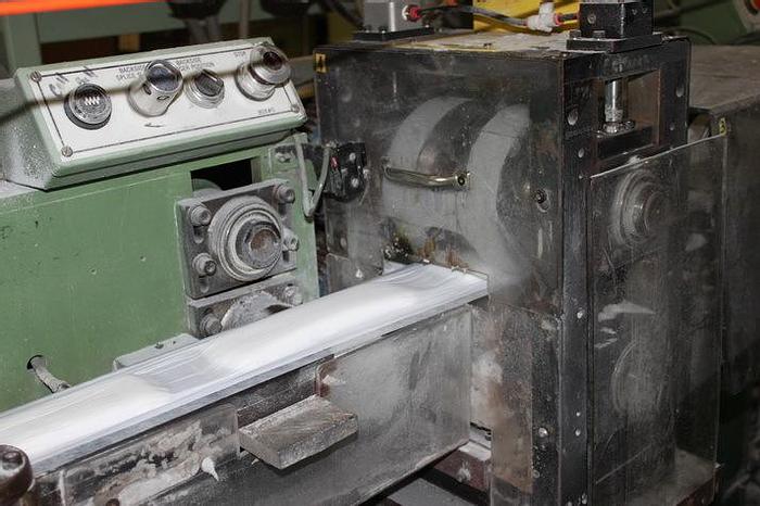 Used RAYNWORTH SANITARY PAD LINE 12" OVERNITE 130 FPM