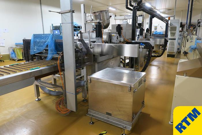 Used PRALINE DEPOSITING, EXTRUDING/FORMING & CHOCOLATE COATING LINE