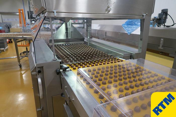 Used PRALINE DEPOSITING, EXTRUDING/FORMING & CHOCOLATE COATING LINE