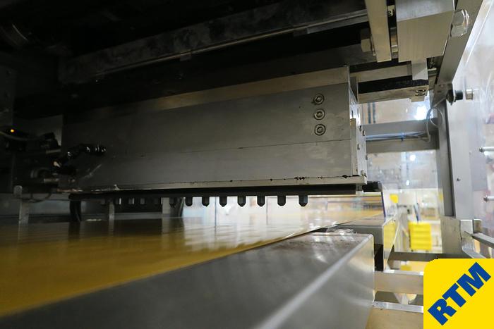 Used PRALINE DEPOSITING, EXTRUDING/FORMING & CHOCOLATE COATING LINE