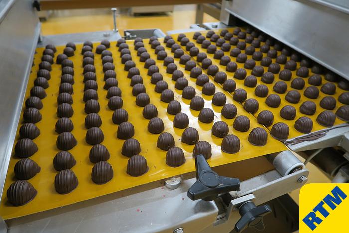 Used PRALINE DEPOSITING, EXTRUDING/FORMING & CHOCOLATE COATING LINE