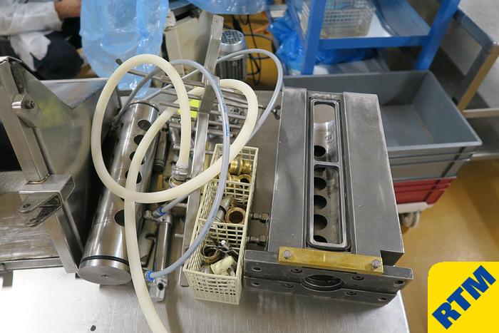 Used PRALINE DEPOSITING/ENROBING LINE