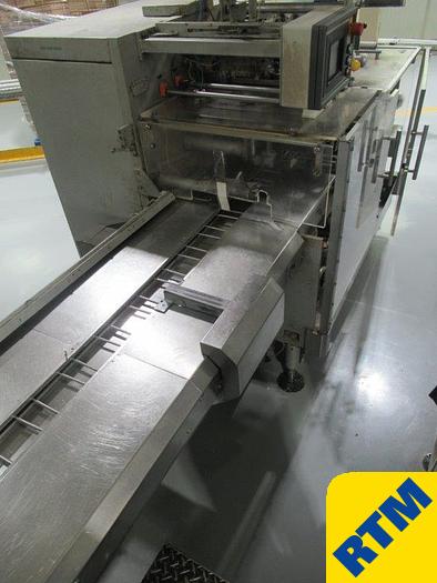 Used (7) Biscuit Roll Wrapping Machines
