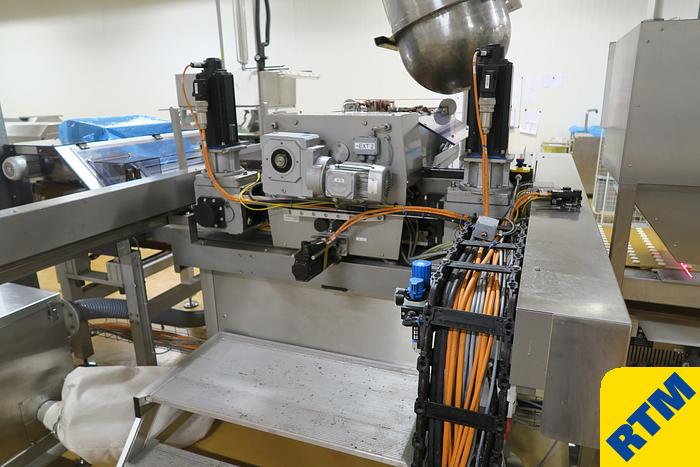 Used PRALINE DEPOSITING, EXTRUDING/FORMING & CHOCOLATE COATING LINE