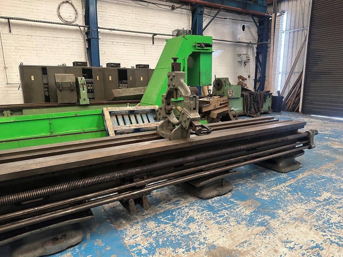 Used Lang 28″ x 200″ Gap bed Centre Lathe