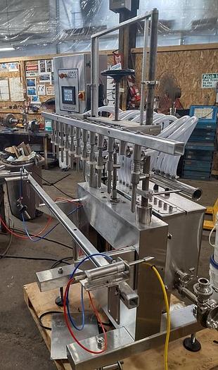 Used Acasi 12 head Pressure Gravity Filler
