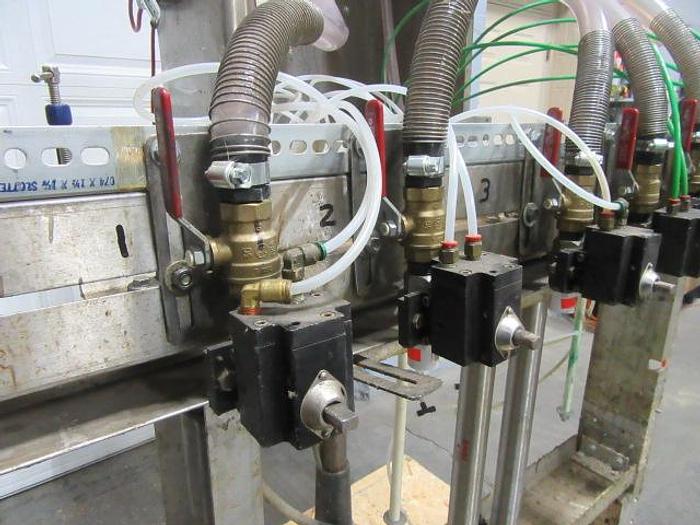 Used 6 SPOUT ELS GRAVITY FILLER