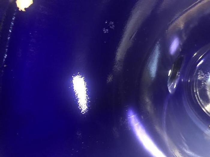 Used Used Glass Lined approximately 3000 gallon vertical glass lined tank