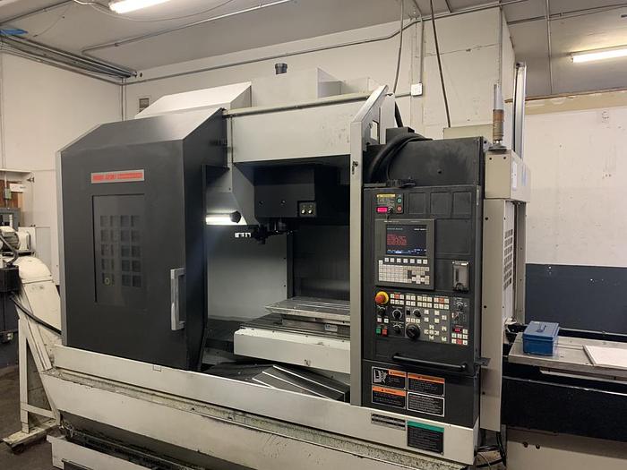 Used DMG Mori Seiki Duravertical 5100 with Midaco Pallet Shuttle
