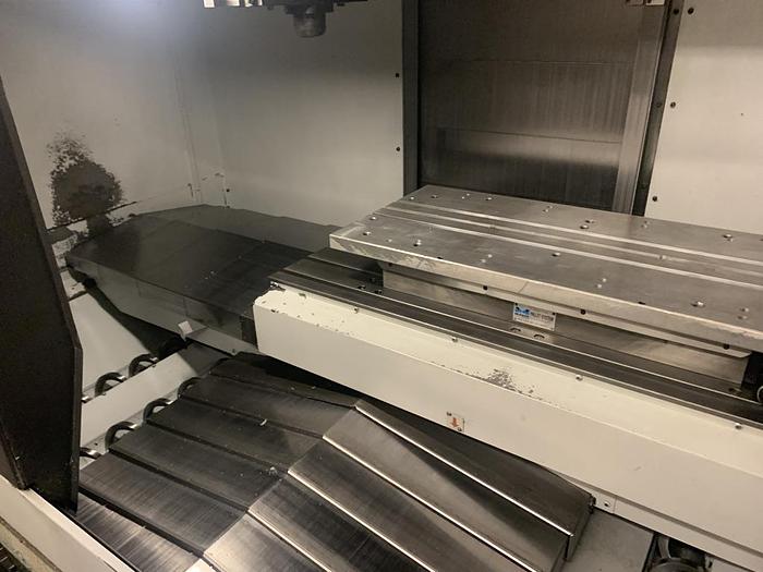 Used DMG Mori Seiki Duravertical 5100 with Midaco Pallet Shuttle