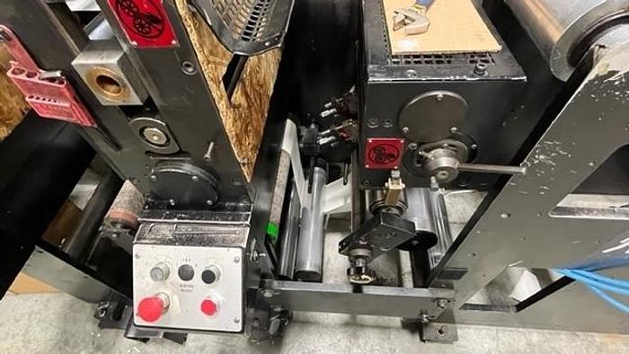 Used 13" WIDE ROTOFLEX SLITTER REWINDER WITH 2 STATION DIE CUTTING
