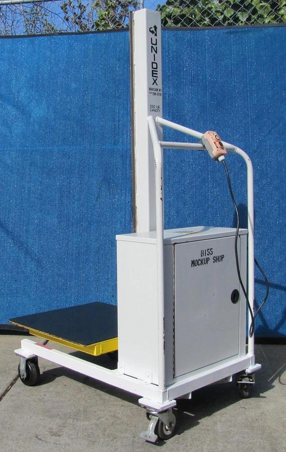 Used Unidex 250 lbs Electric Material Lift 31" Height 24" x 24" Platform 12V Battery