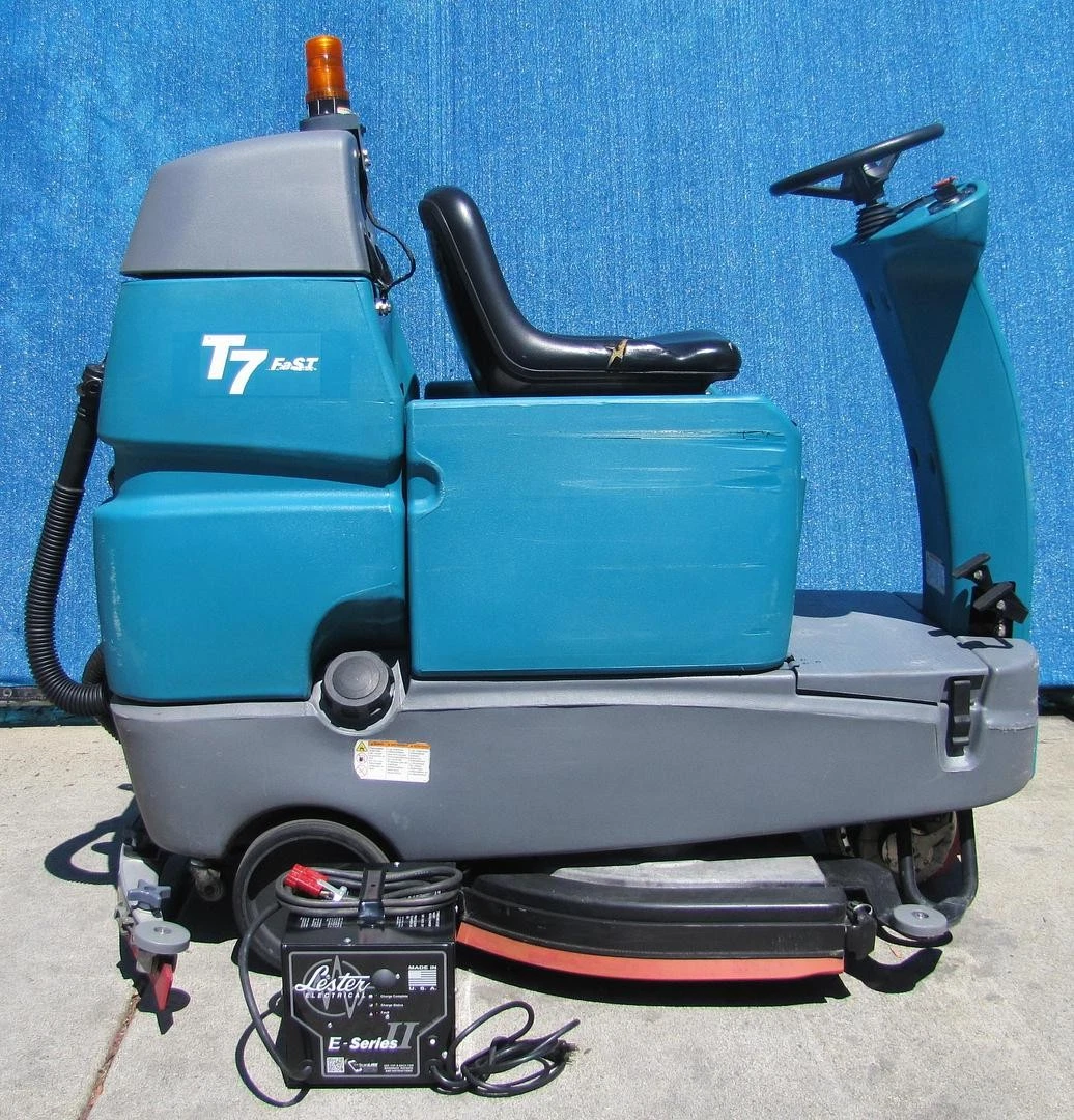 Used Tennant T7 Ride On Floor Scrubber 32" Disc Pad Holder 24 VDC With Charger