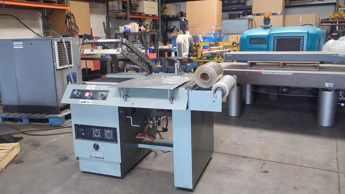 Used Weldotron 5201A L-Bar Heat Shrink Sealer Wrapping Machine & Conveyor 220V 1 Ph