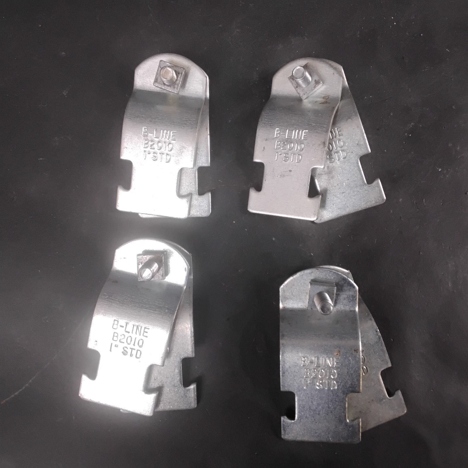 Used COOPER B-LINE B2010 CONDUIT CLAMP - GROUP OF 4 ($12 OBO)