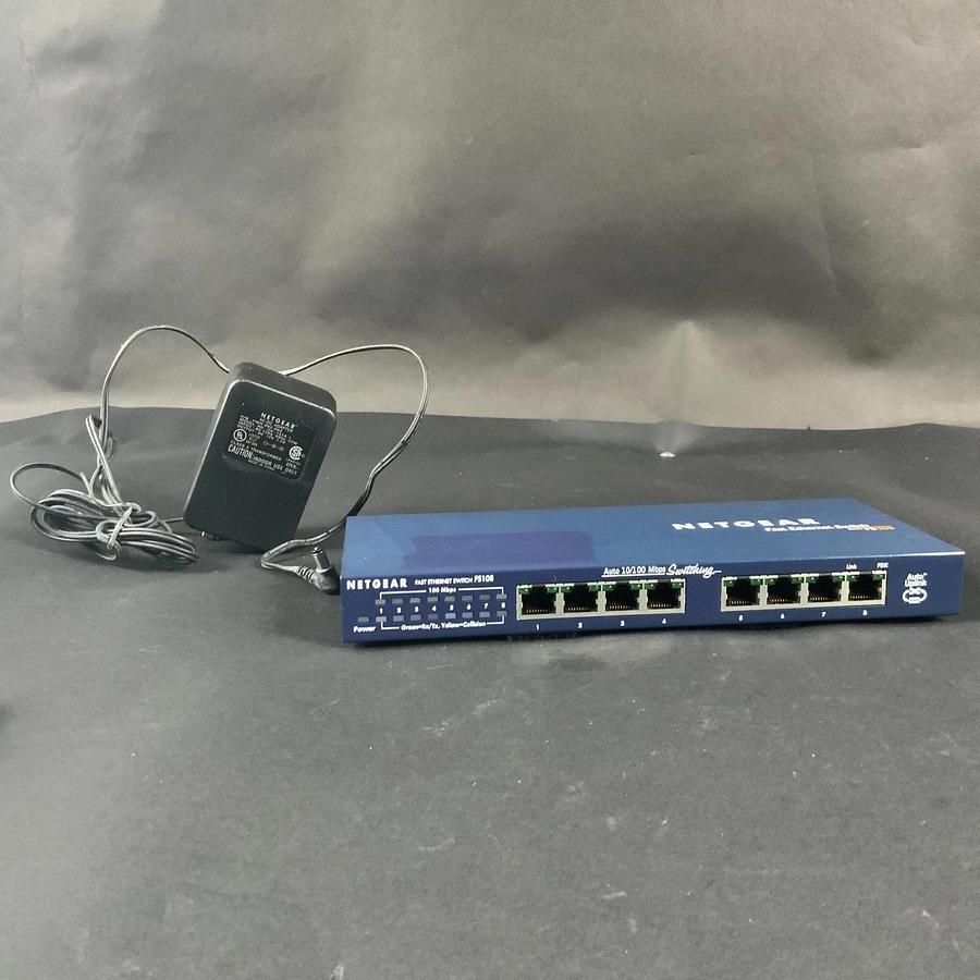 Used NETGEAR FS108 FAST ETHERNET SWITCH W/ POWER ADAPTOR ($25 OBO)