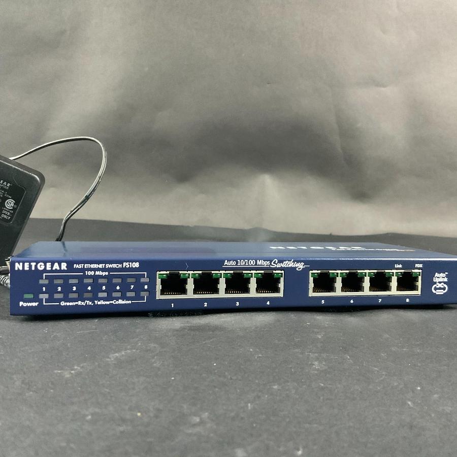 Used NETGEAR FS108 FAST ETHERNET SWITCH W/ POWER ADAPTOR ($25 OBO)