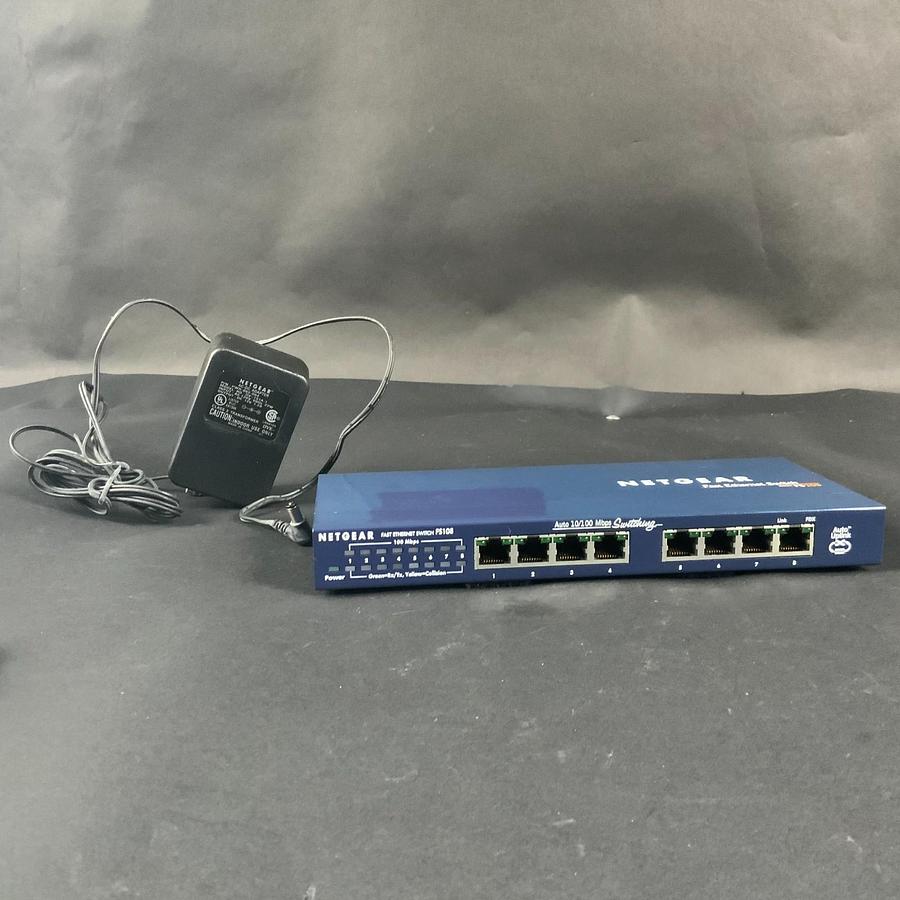 Used NETGEAR FS108 FAST ETHERNET SWITCH W/ POWER ADAPTOR ($25 OBO)