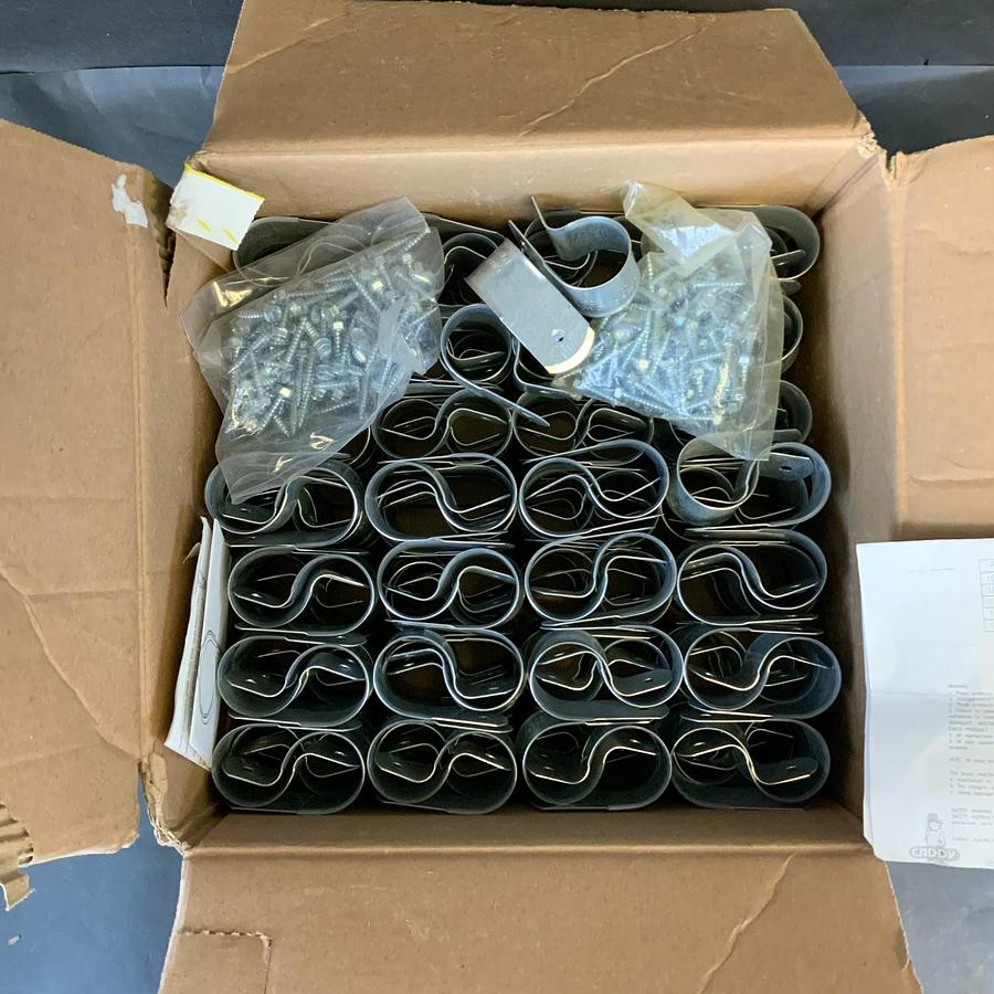 Used CADDY 107 1" ONE HOLE WRAPAROUND STRAP - BOX OF 203 ($80 OBO)