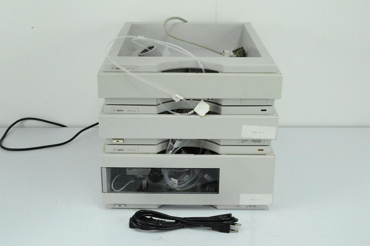 Used Agilent 1100 HPLC G1311A Quat Pump with G1379A Degasser & tray