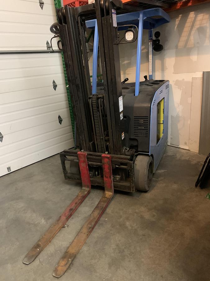 Used Forklift (model) with battery charger and 5 gallon mini pump