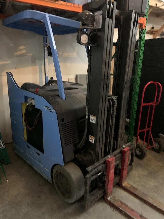 Used Forklift (model) with battery charger and 5 gallon mini pump
