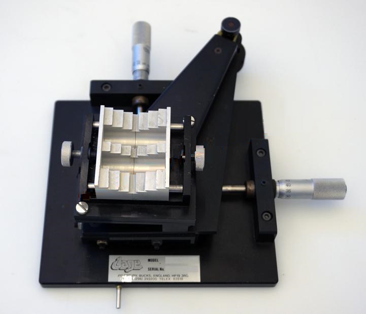 Used Dage hold down fixtures